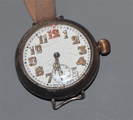 A gentlemans early 20th century white metal cased manual wind wrist watch, with Arabic dial and subsidiary seconds, on later strap.